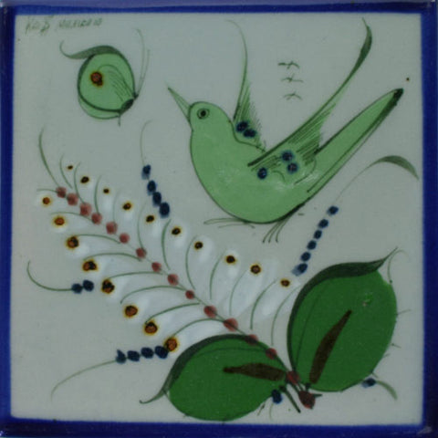 Ken Edwards green bird and butterfly tile